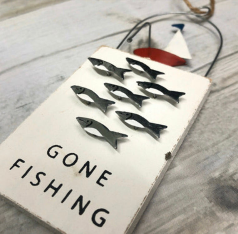 Gone fishing hanging sign by Shoeless Joe.