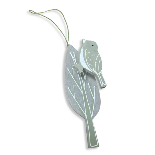 Green bird on a tree hanger by shoeless Joe