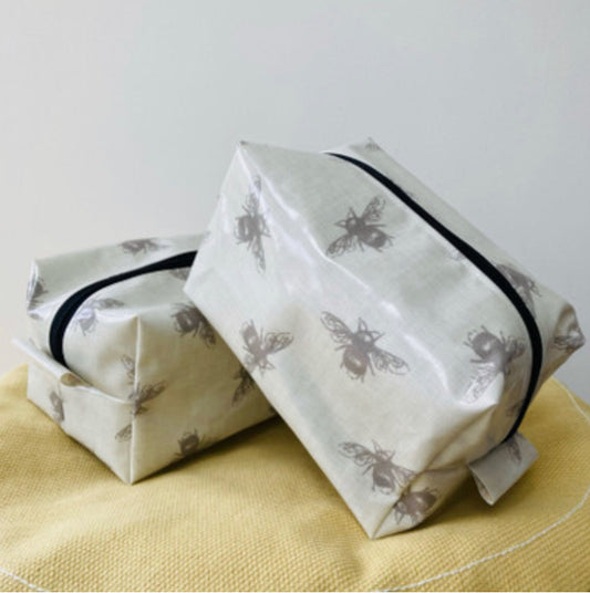 Grey bee vinyl fabric pouches / washbags by Stella's Stitchcraft