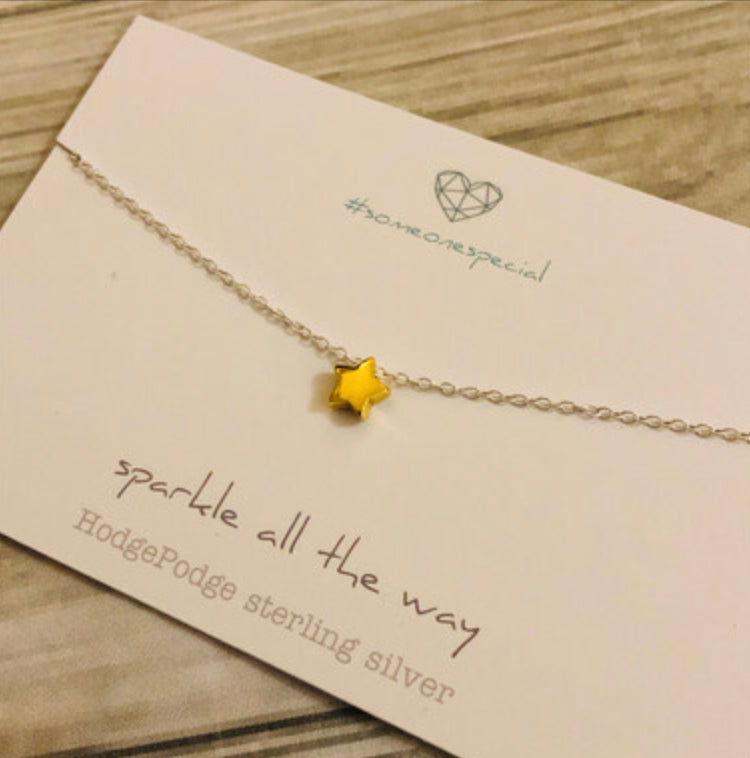 Gold star necklace- sparkle all the way.  Sterling silver necklace
