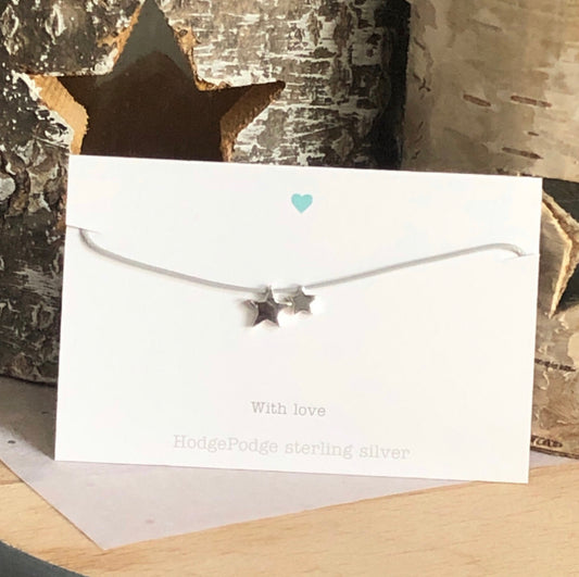 Double star sterling silver charm bracelet