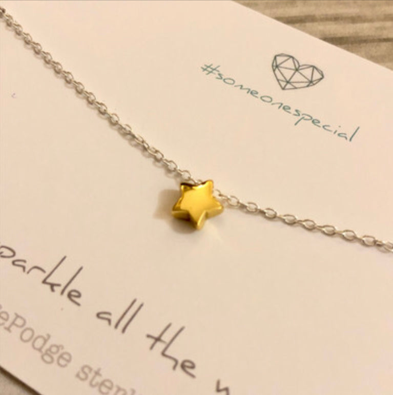 Gold star necklace- sparkle all the way.  Sterling silver necklace