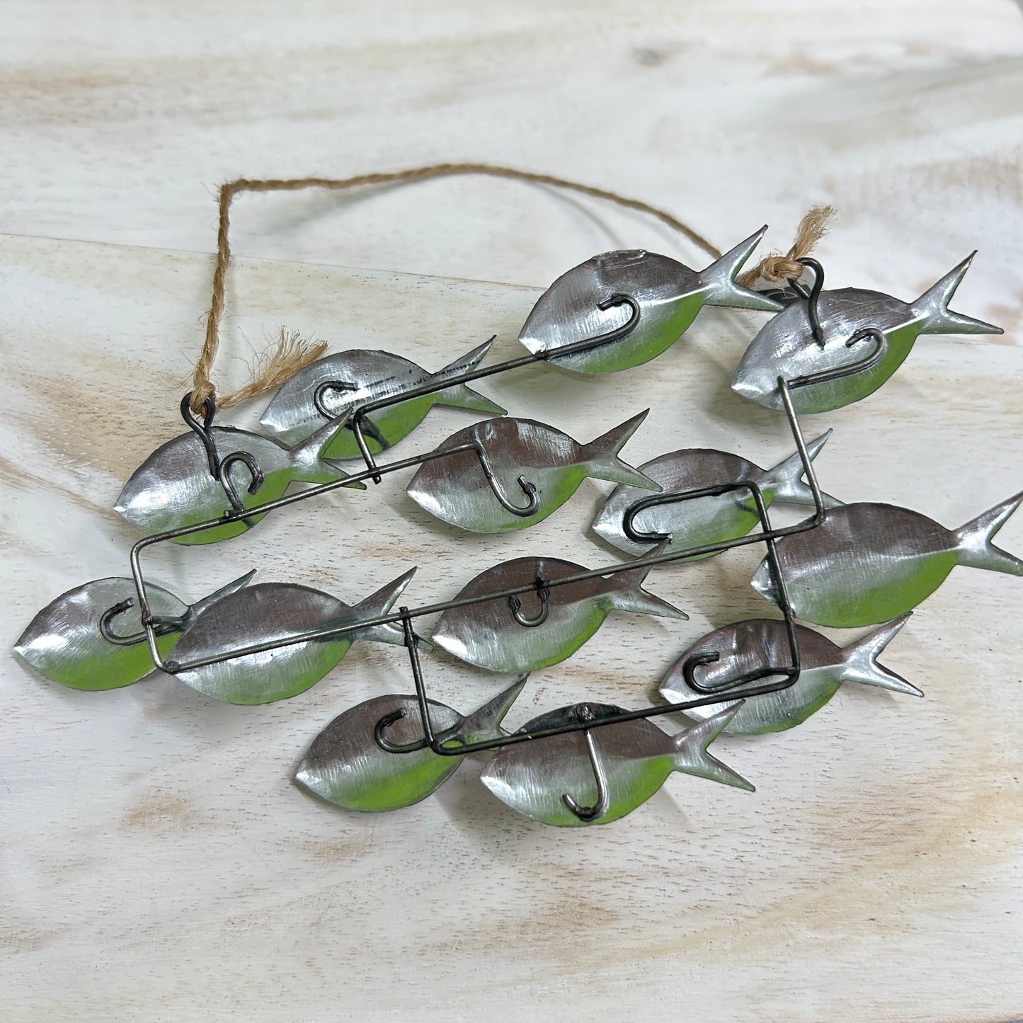 Hanging school of fish in silver