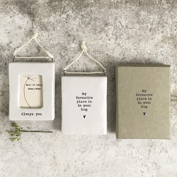 My favorite Place is your Hug.  Small ceramic photo frame