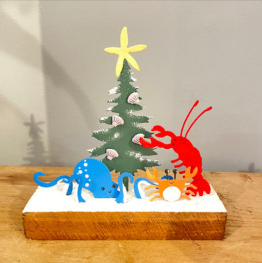Lobster, octopus & crab decorating the Christmas tree. Standing ornament by Shoeless Joe