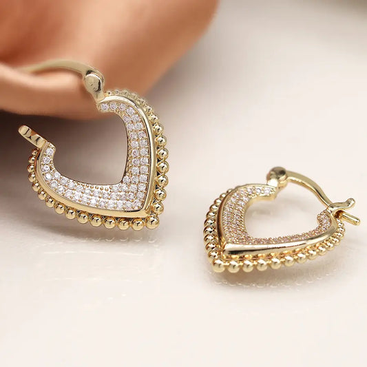 Faux gold v-point hoop earrings with multi crystal inset and decorative edge