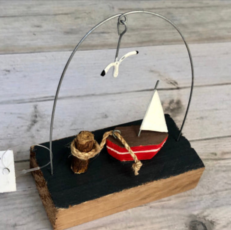 Shoeless Joe little red sail boat
