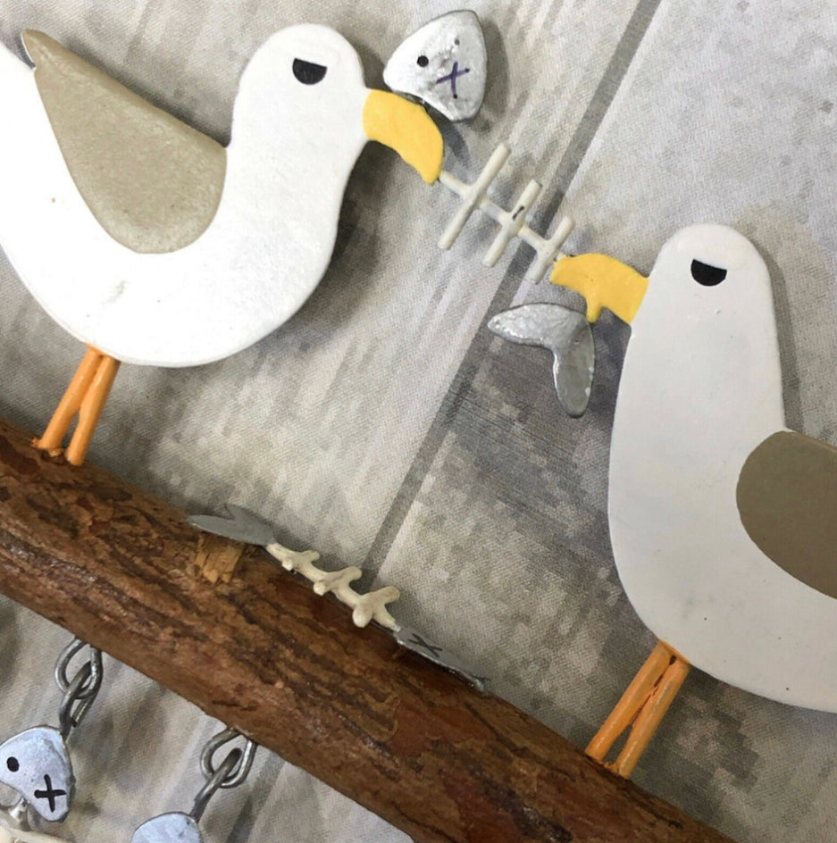 Seagulls sharing platter hanging decoration by Shoeless Joe