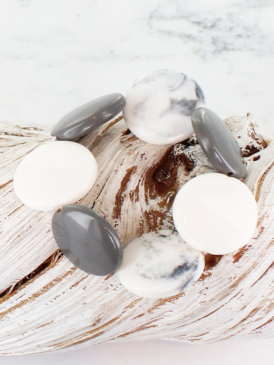 Elasticated resin disc bracelet by Suzie Blue- Grey, White and smokey grey.