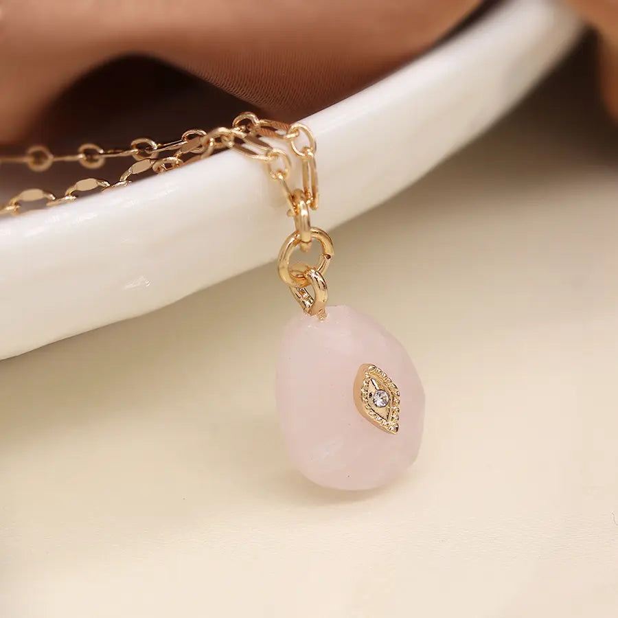 Golden fine chain and pink stone pendant necklace