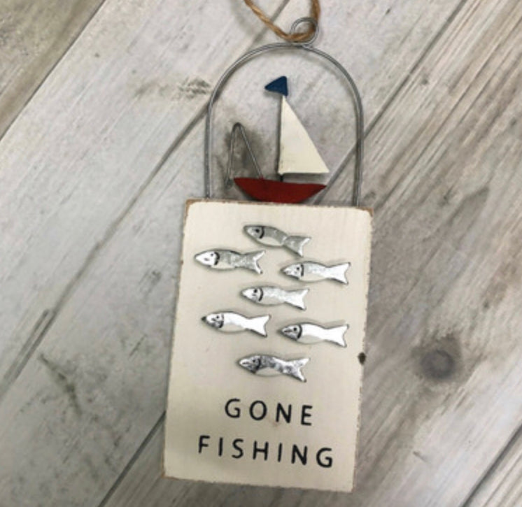 Gone fishing hanging sign by Shoeless Joe.
