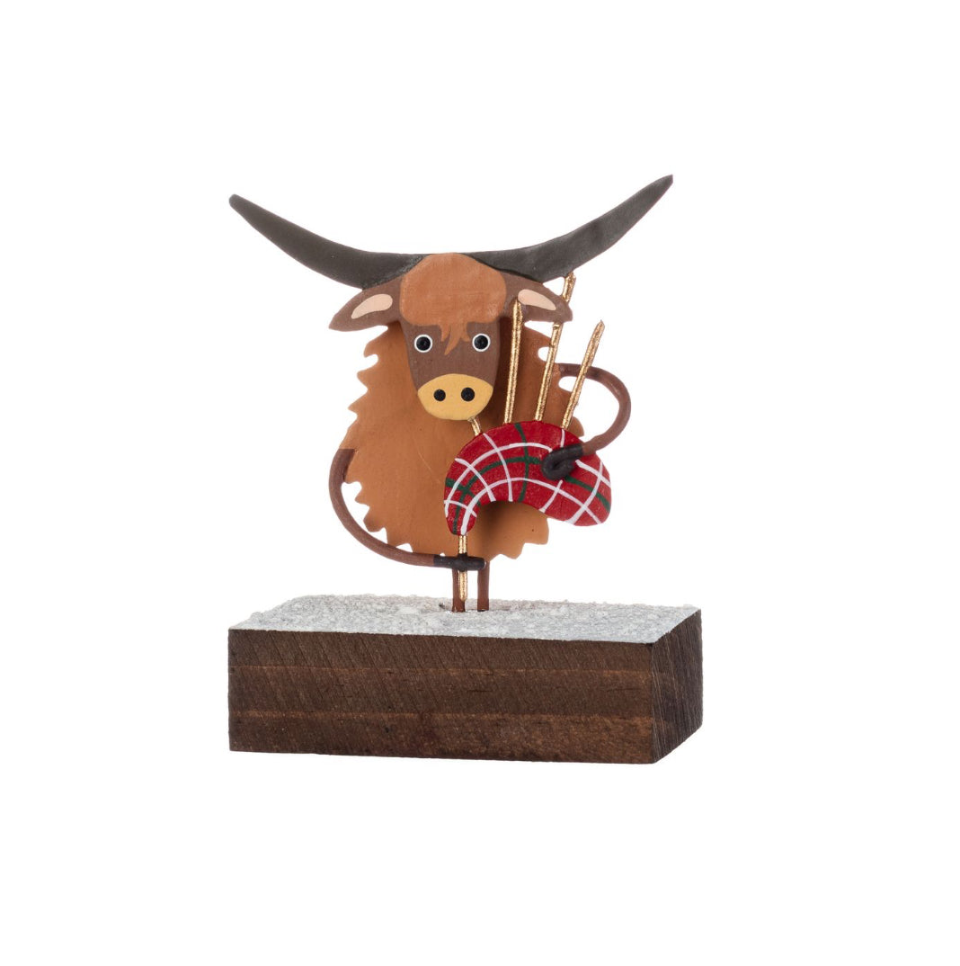 Bagpiping Coo On Block. Highland cow ornament