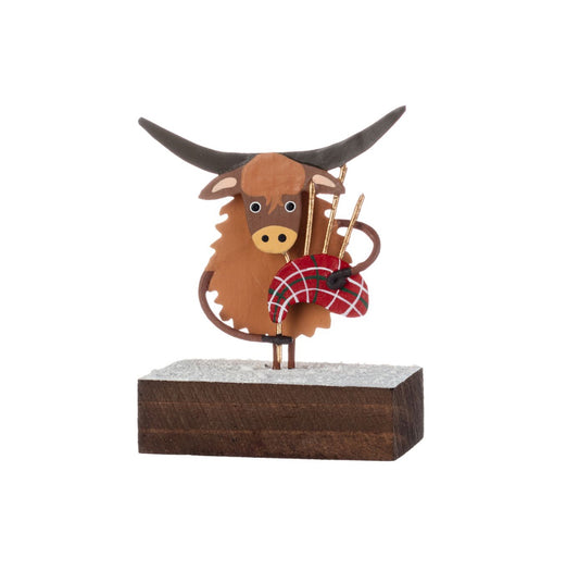 Bagpiping Coo On Block. Highland cow ornament