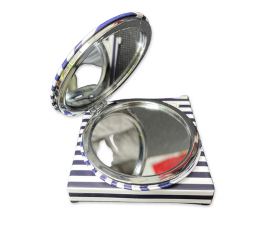Hey good looking compact mirror.