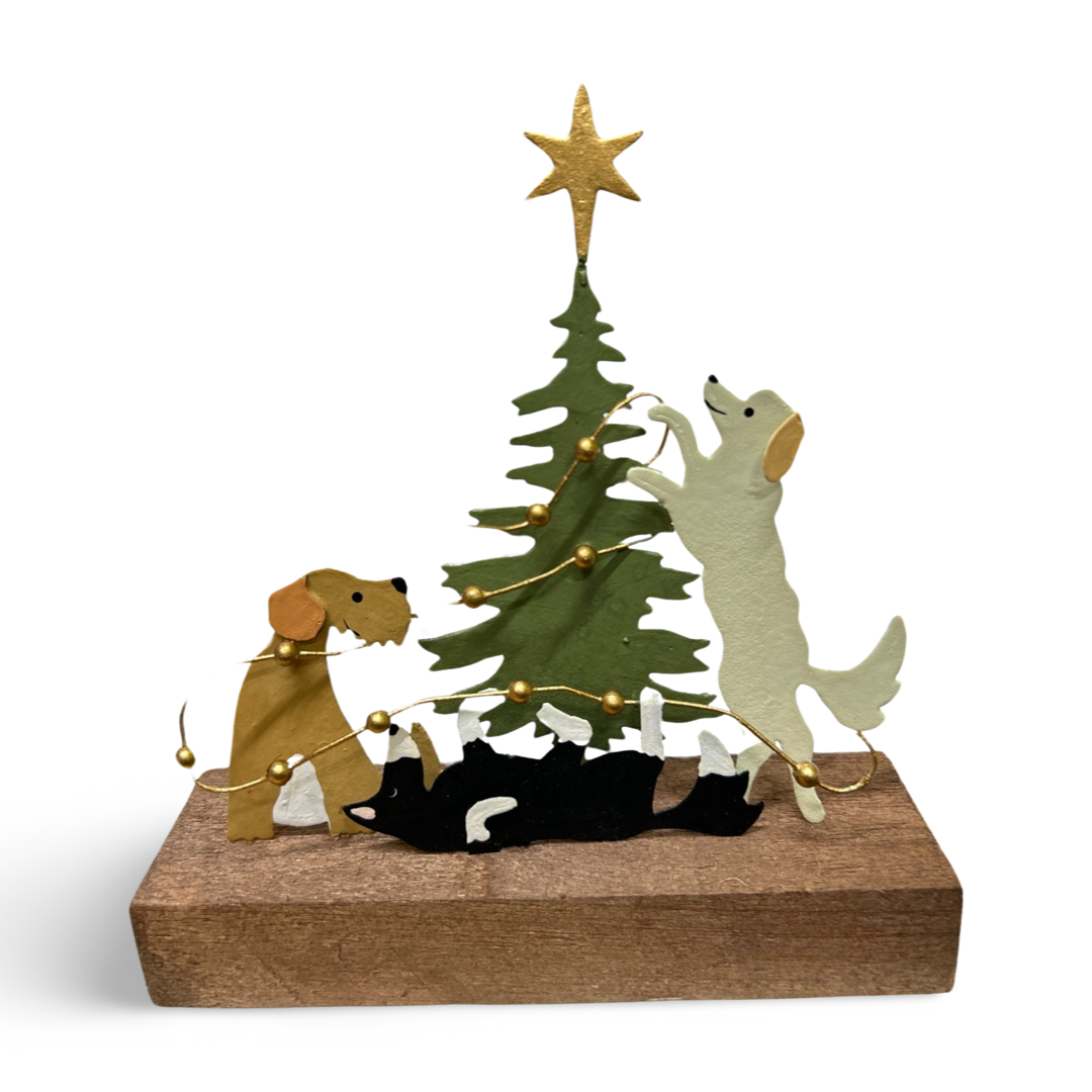 Dogs dressing the Christmas tree