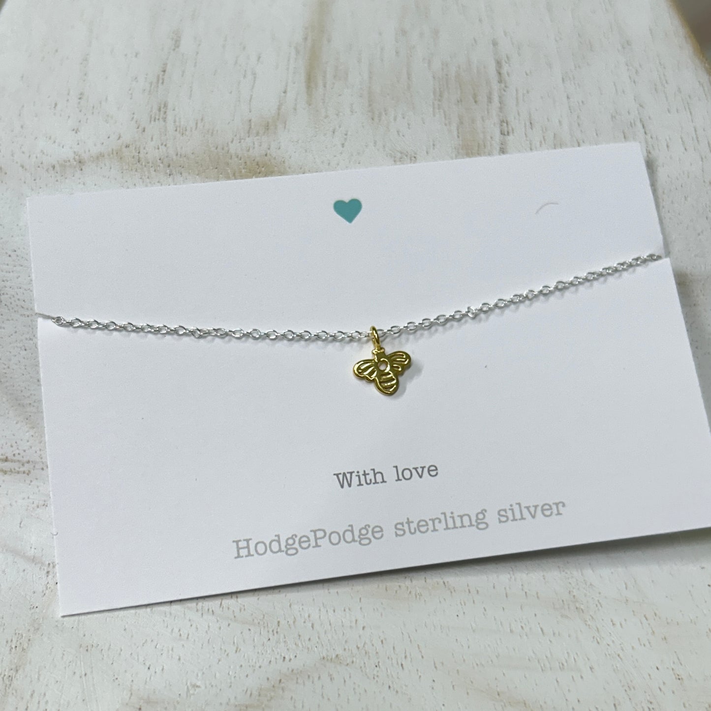 Tiny bee charm sterling silver bracelet