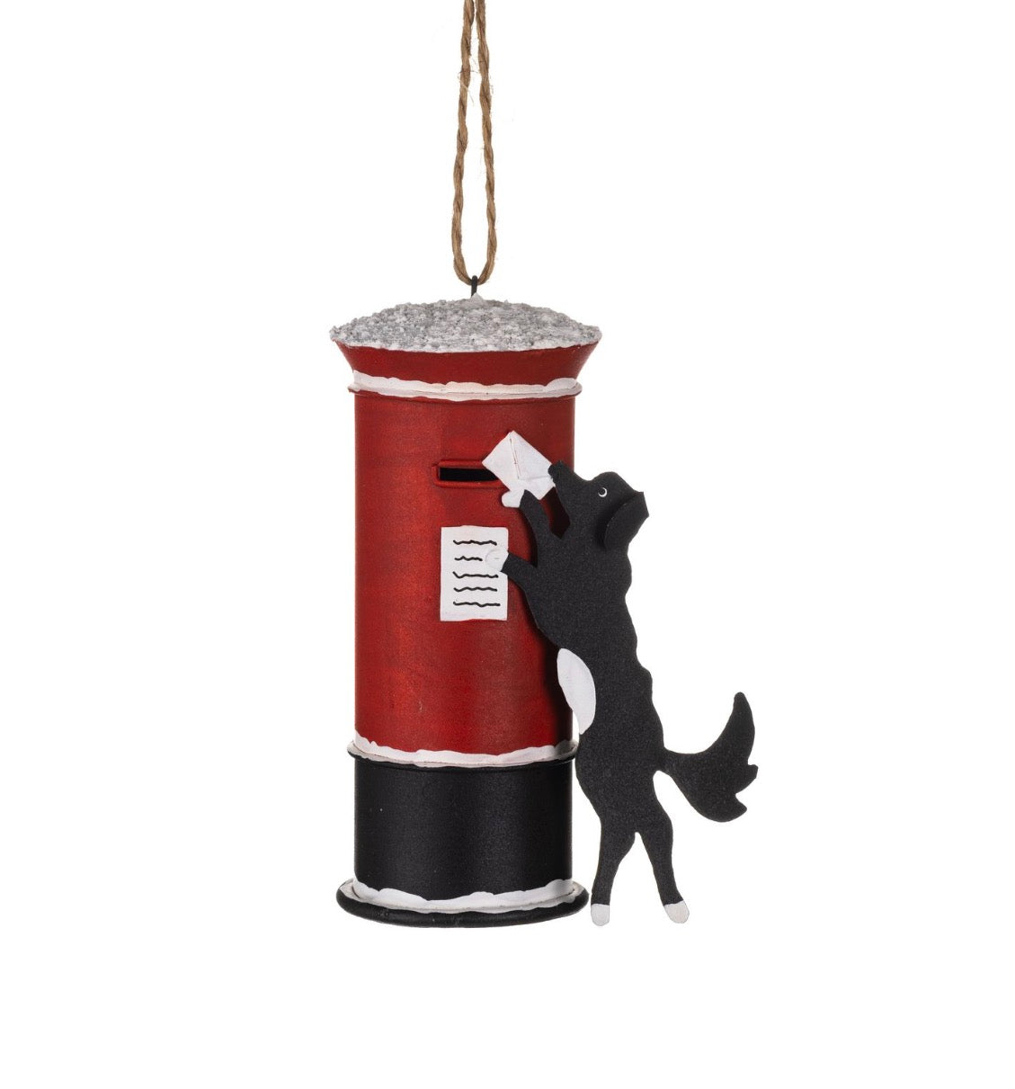 Dog posting Christmas card tree decoration.