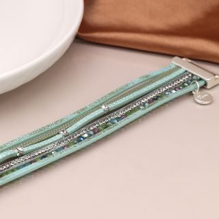 Aqua leather bracelet with mixed beads and crystals. Magnetic fastening.
